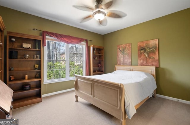 bedroom featuring carpet flooring, ceiling fan, and baseboards