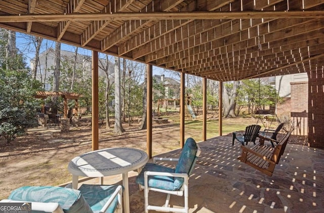 view of patio featuring outdoor dining space