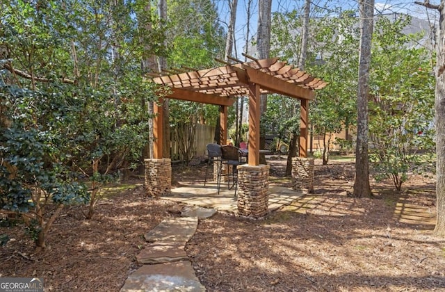 view of yard with a patio and a pergola