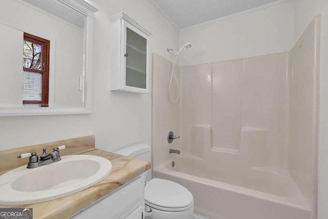 full bath with bathtub / shower combination, crown molding, vanity, and toilet