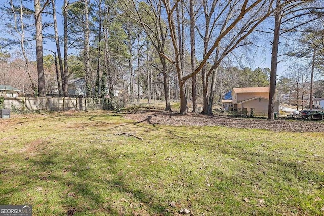 view of yard with fence