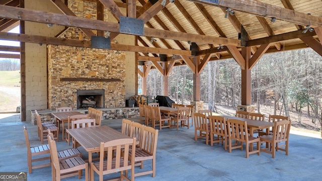 103 Wisteria Dr, Murphy, NC 28906 - view of patio / terrace with outdoor dining area, an outdoor stone fireplace, and a gazebo