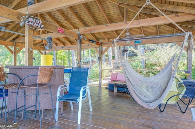 sunroom featuring lofted ceiling