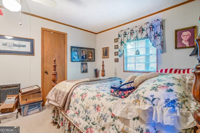 bedroom with ornamental molding, carpet, an AC wall unit, and a ceiling fan