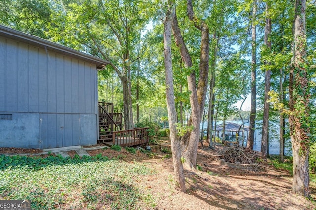 view of yard featuring stairs