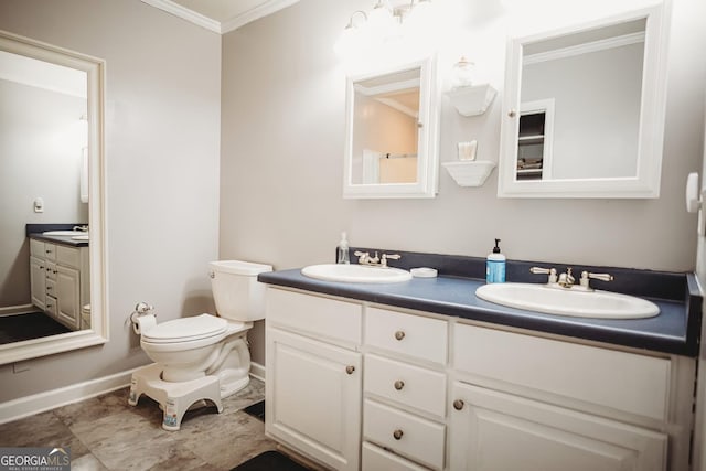 full bathroom featuring double vanity, ornamental molding, and a sink