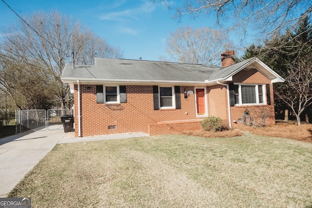 ranch-style house with brick siding, a chimney, a front yard, crawl space, and a gate