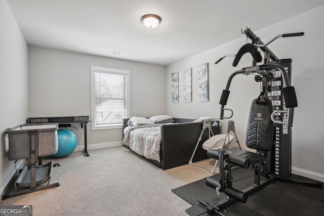 bedroom with carpet, visible vents, and baseboards