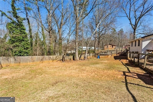 view of yard with fence