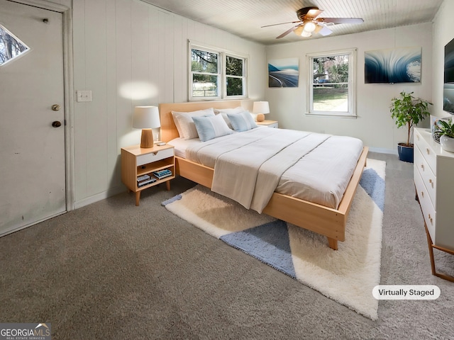 carpeted bedroom with ceiling fan