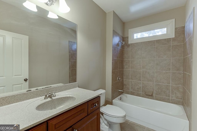 full bath with tile patterned flooring, tub / shower combination, vanity, and toilet