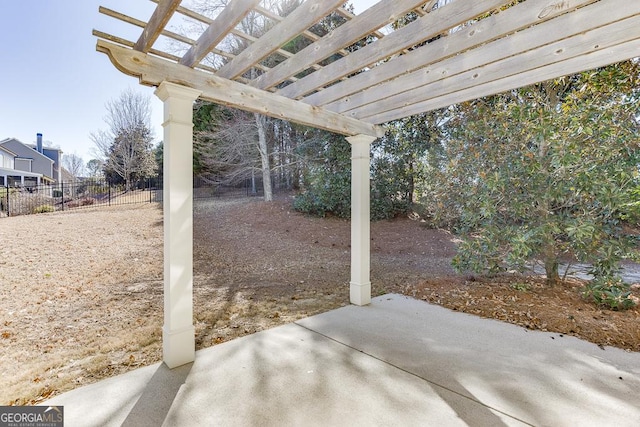 view of patio with fence and a pergola