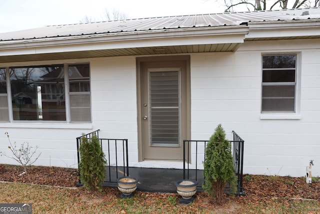 entrance to property with metal roof