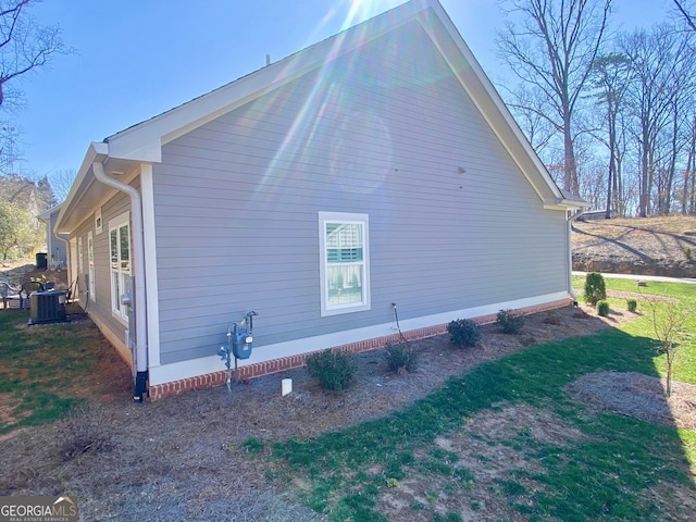 view of home's exterior with central air condition unit