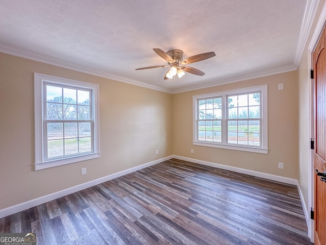 spare room with baseboards, dark wood finished floors, a ceiling fan, crown molding, and a textured ceiling