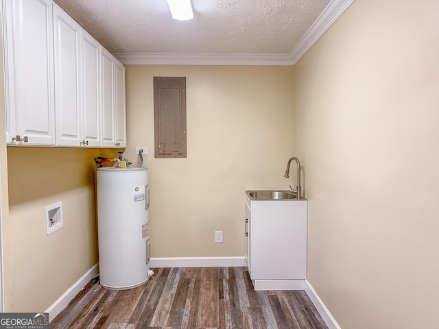 laundry area with a sink, water heater, cabinet space, electric panel, and dark wood finished floors