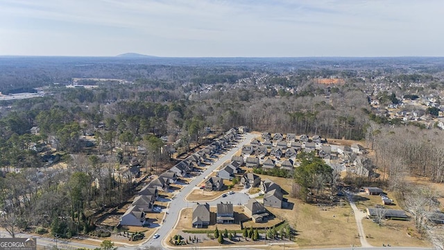 drone / aerial view with a forest view