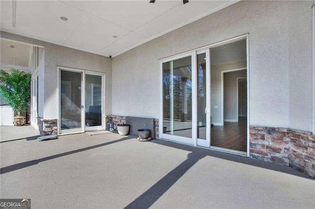 view of patio featuring french doors