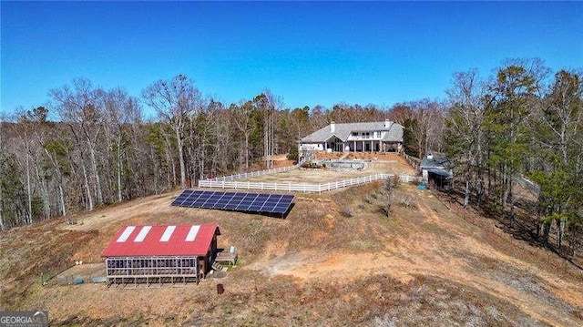 view of yard with a forest view