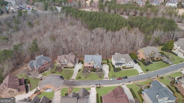 aerial view of property's location featuring nearby suburban area