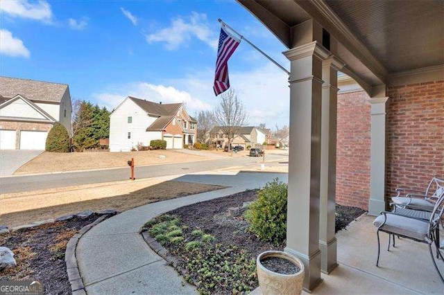 view of yard featuring a residential view