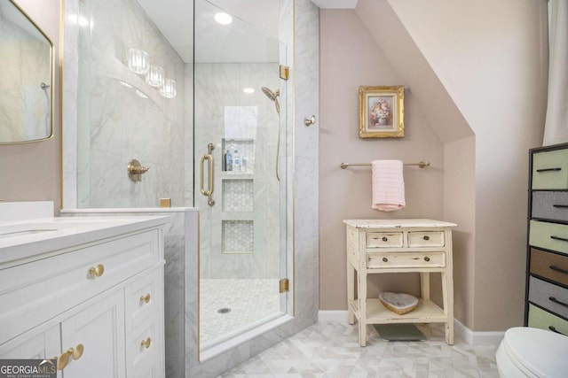 487 Glendale Ct, Stone Mountain, GA 30087 - full bath with a stall shower, baseboards, vanity, and toilet