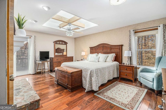 487 Glendale Ct, Stone Mountain, GA 30087 - bedroom with a skylight, ceiling fan, and wood finished floors