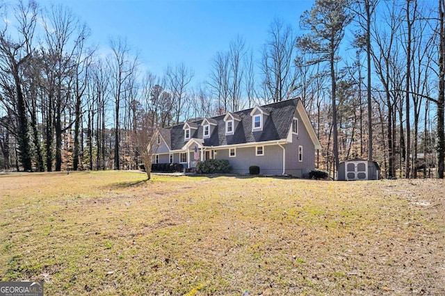 487 Glendale Ct, Stone Mountain, GA 30087 - exterior space with an outbuilding, a storage unit, and a front yard