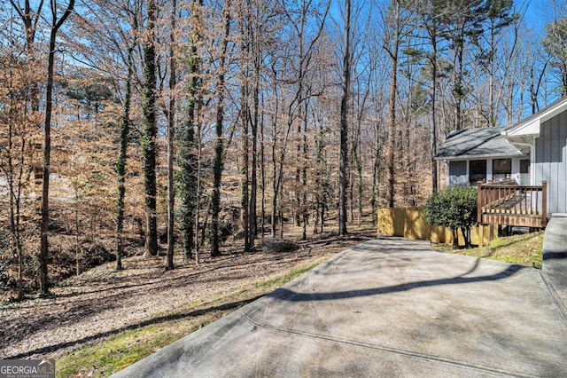 487 Glendale Ct, Stone Mountain, GA 30087 - exterior space with driveway and a wooden deck