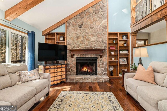 487 Glendale Ct, Stone Mountain, GA 30087 - living room with high vaulted ceiling, a fireplace, dark wood finished floors, and beamed ceiling