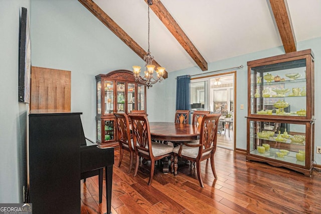 487 Glendale Ct, Stone Mountain, GA 30087 - dining space with lofted ceiling with beams, an inviting chandelier, and wood finished floors
