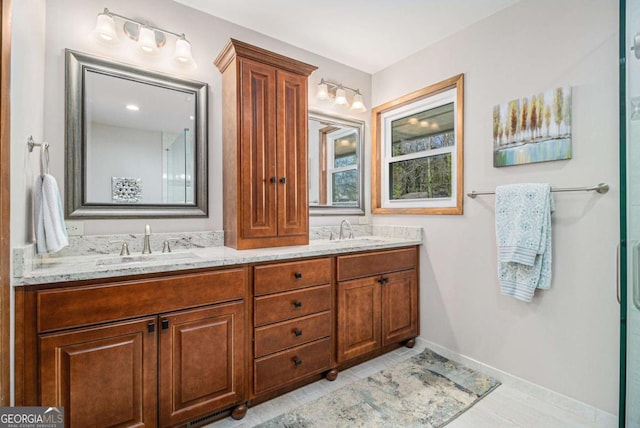 487 Glendale Ct, Stone Mountain, GA 30087 - full bath with a sink, baseboards, and double vanity