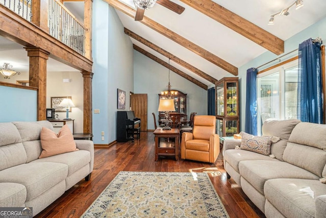 487 Glendale Ct, Stone Mountain, GA 30087 - living room featuring high vaulted ceiling, baseboards, dark wood-style floors, beamed ceiling, and ornate columns