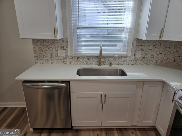 938 Rebel Forest Dr SE, Atlanta, GA 30315 - kitchen with appliances with stainless steel finishes, light countertops, white cabinets, and a sink