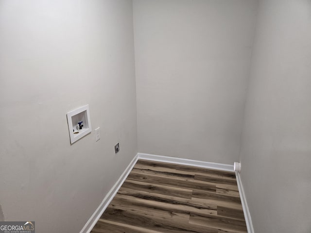 938 Rebel Forest Dr SE, Atlanta, GA 30315 - clothes washing area featuring laundry area, wood finished floors, hookup for a washing machine, and baseboards