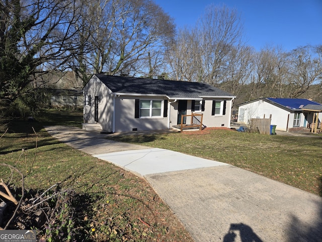 view of front of home with crawl space, brick siding, and a front yard