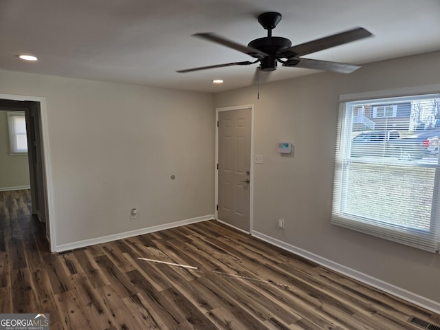 938 Rebel Forest Dr SE, Atlanta, GA 30315 - empty room featuring dark wood-style flooring, recessed lighting, visible vents, a ceiling fan, and baseboards
