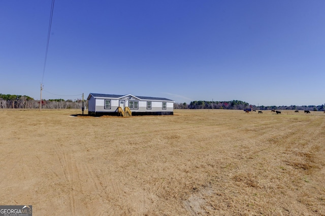 manufactured / mobile home with a rural view