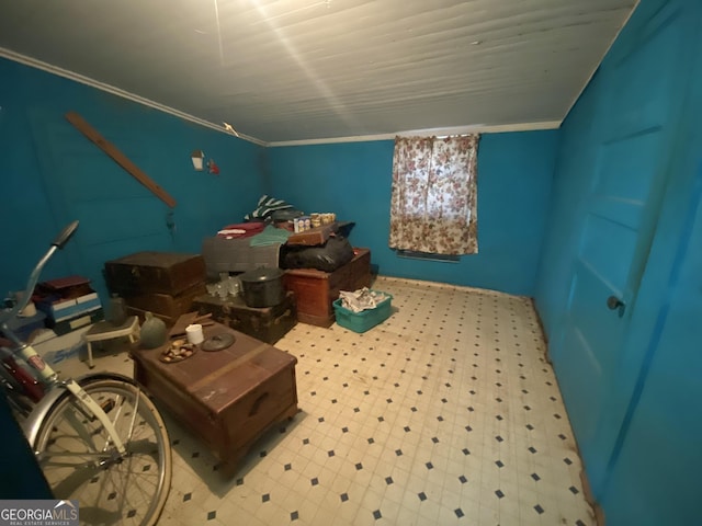 interior space featuring lofted ceiling and tile patterned floors