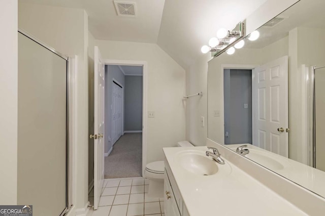 bathroom featuring visible vents, toilet, a shower stall, vanity, and tile patterned flooring