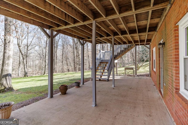 view of patio featuring stairway