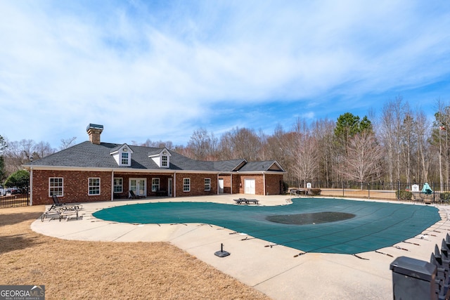 view of pool with a patio, fence, and a fenced in pool