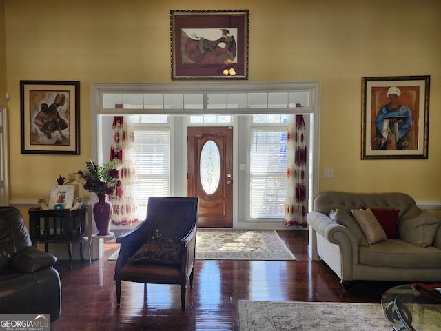 foyer featuring wood finished floors