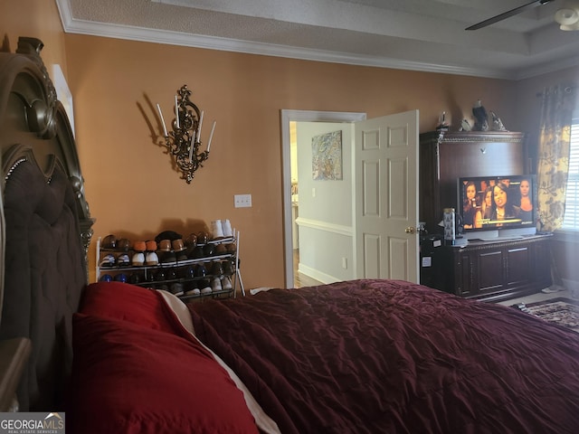 bedroom with crown molding