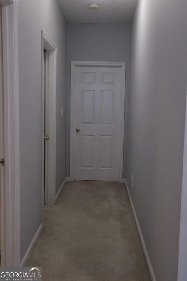 hallway with baseboards