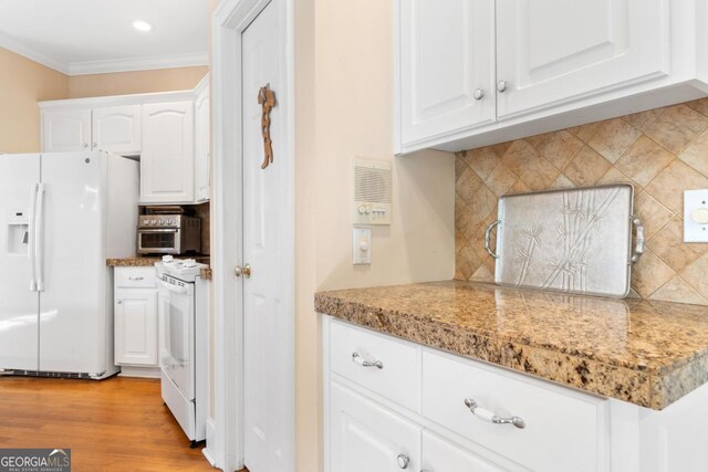 kitchen with white cabinets, white appliances, ornamental molding, and decorative backsplash