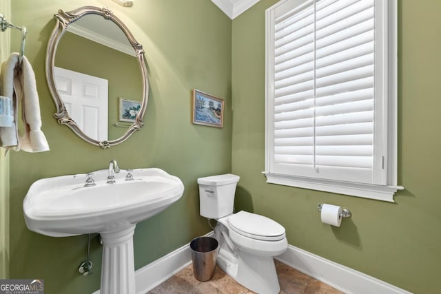 1020 Troublesome Creek Ln, Greensboro, GA 30642 - half bath with baseboards, ornamental molding, and toilet