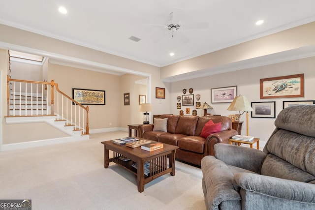 living area with recessed lighting, stairway, ornamental molding, and light colored carpet