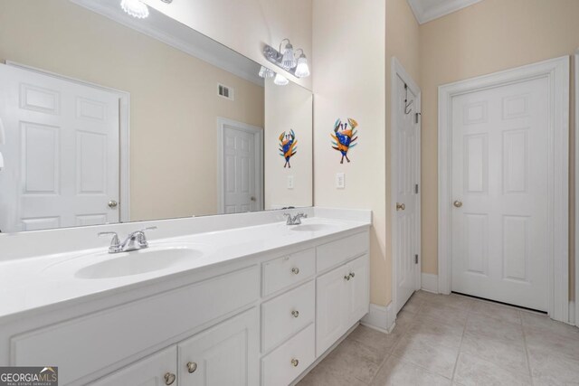 full bathroom with double vanity, tile patterned flooring, a sink, and visible vents