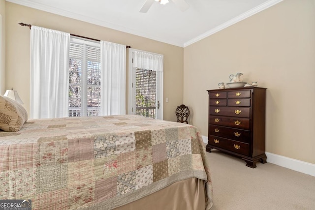 carpeted bedroom with access to exterior, ceiling fan, baseboards, and crown molding